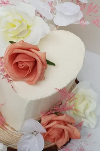 Heart peach rose buttercream celebration cake Closeup