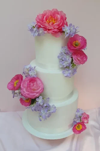 Fondant pink poppy and Lilac wedding cake