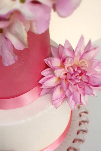 Detail of red sparkling wedding cake